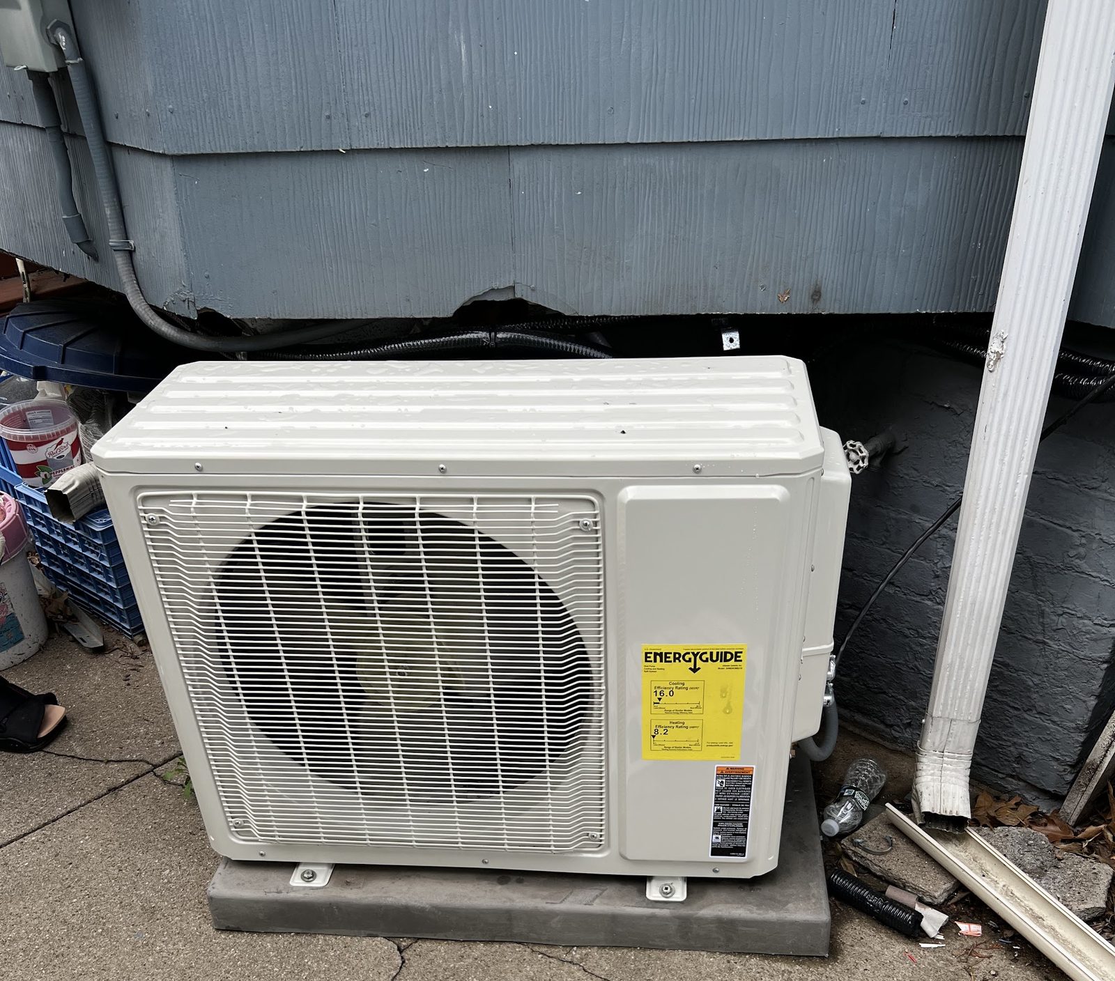 Ductless mini split outdoor condenser installed beside a New Jersey home
