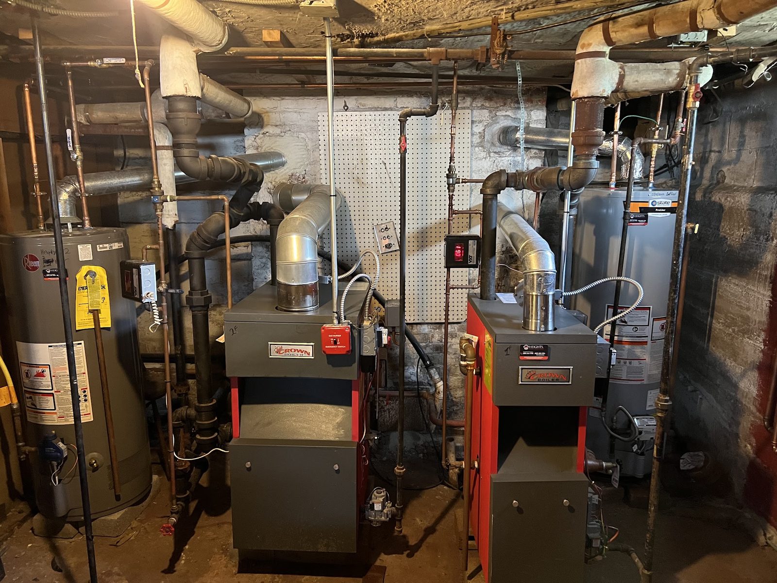 Two boilers and a water heater installed in a New Jersey basement by Heights